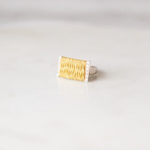 hand-crafted-18k-white-gold-ring-with-18k-yellow-gold-rope-detail-and-diamond-stone